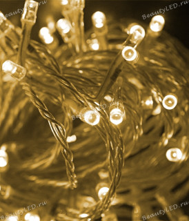 Светодиодная нить, 10 м., 100 LED, 24V, селикон, прозр. пр., хони голд, LaitCom, арт. EST100-10-1HG 05-184