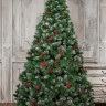 Искусственная сосна Очарование с шишками и красными ягодками заснеженная 180 см., арт. 141180